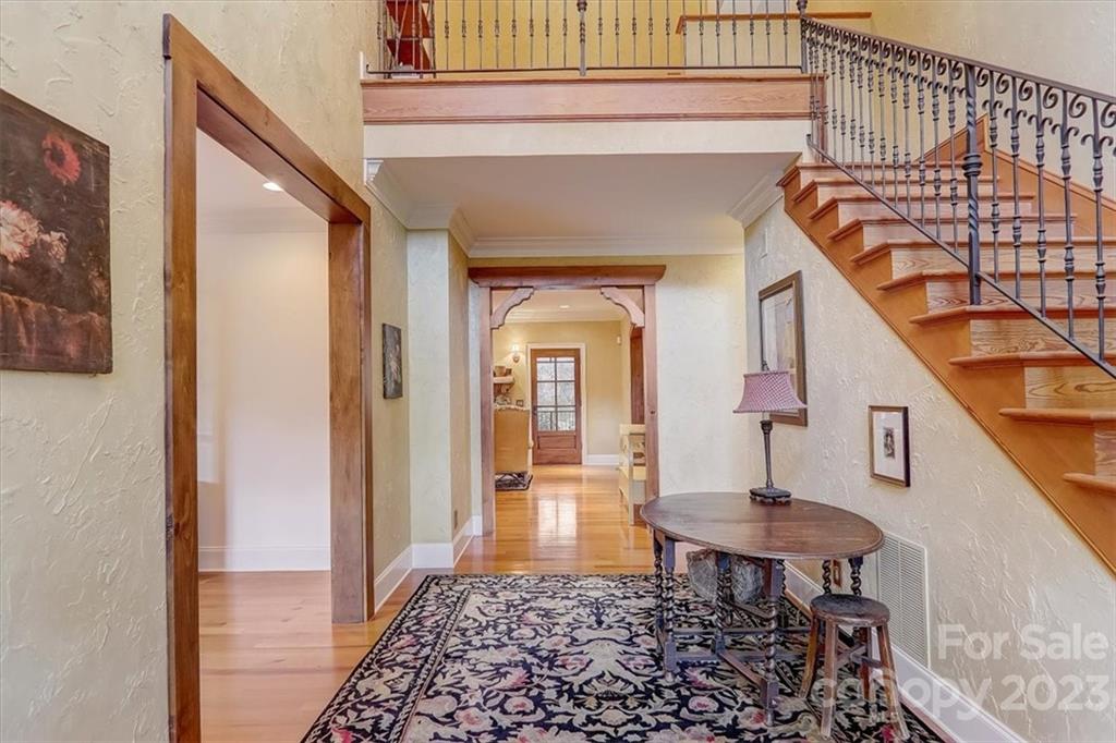 99 Mullally Drive Flat Rock, NC 28731 - Photo 4 of 48 a front view of a house with a bench