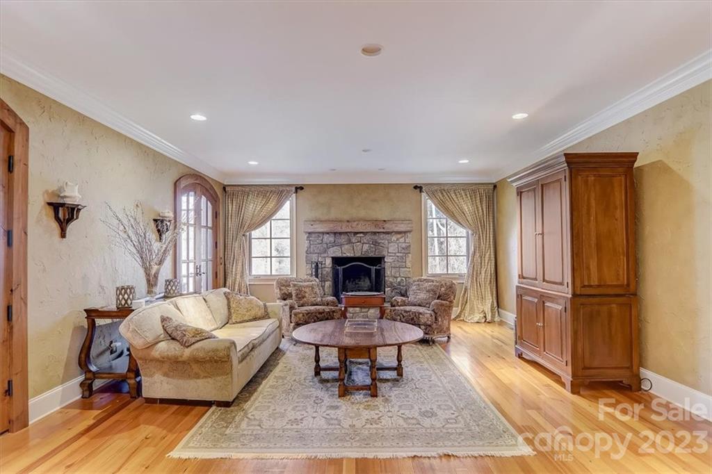 99 Mullally Drive Flat Rock, NC 28731 - Photo 6 of 48 a living room with furniture and a fireplace