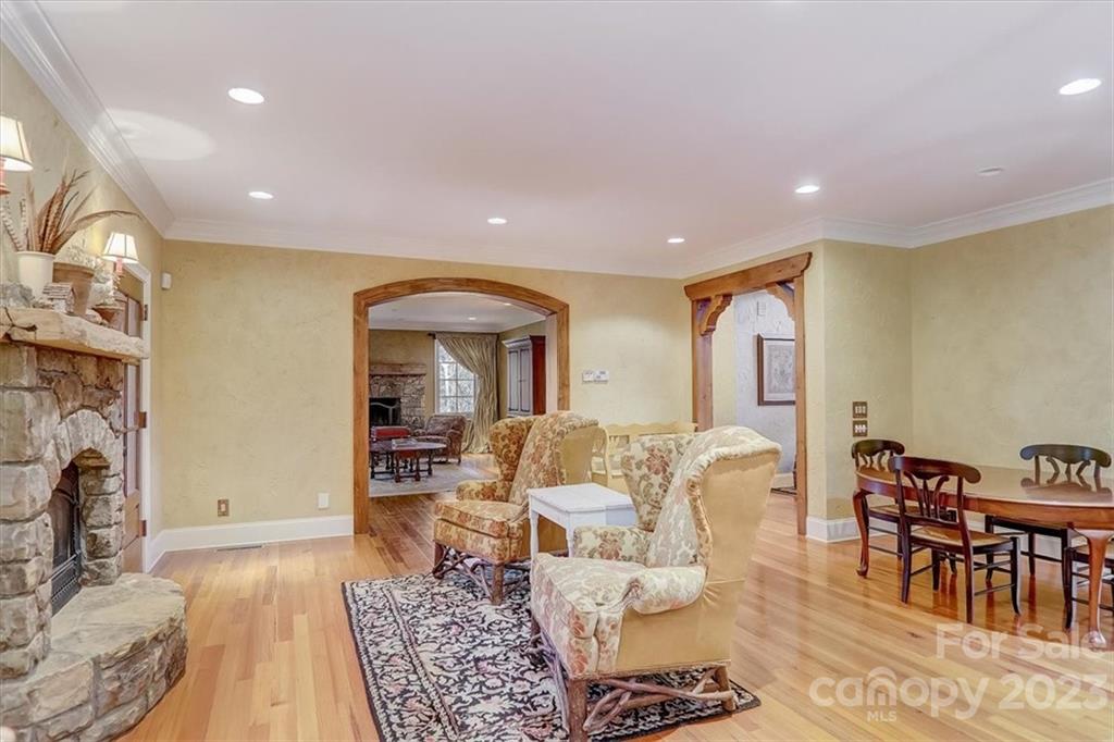 99 Mullally Drive Flat Rock, NC 28731 - Photo 7 of 48 a living room with furniture and a fireplace