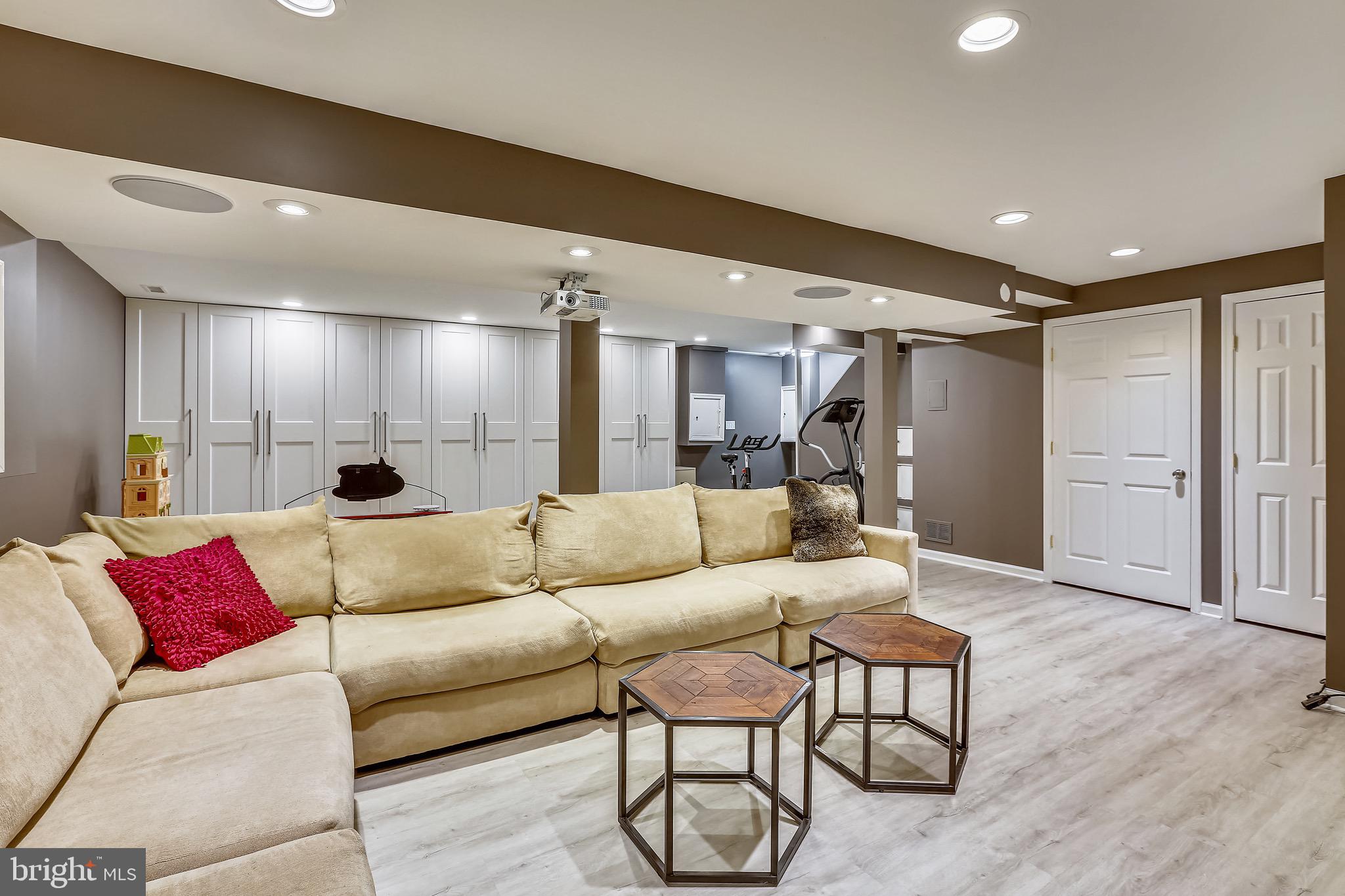 9407 Monroe Street Silver Spring, MD 20910 - Photo 51 of 69 Lower Level Rec room with Wall of Storage