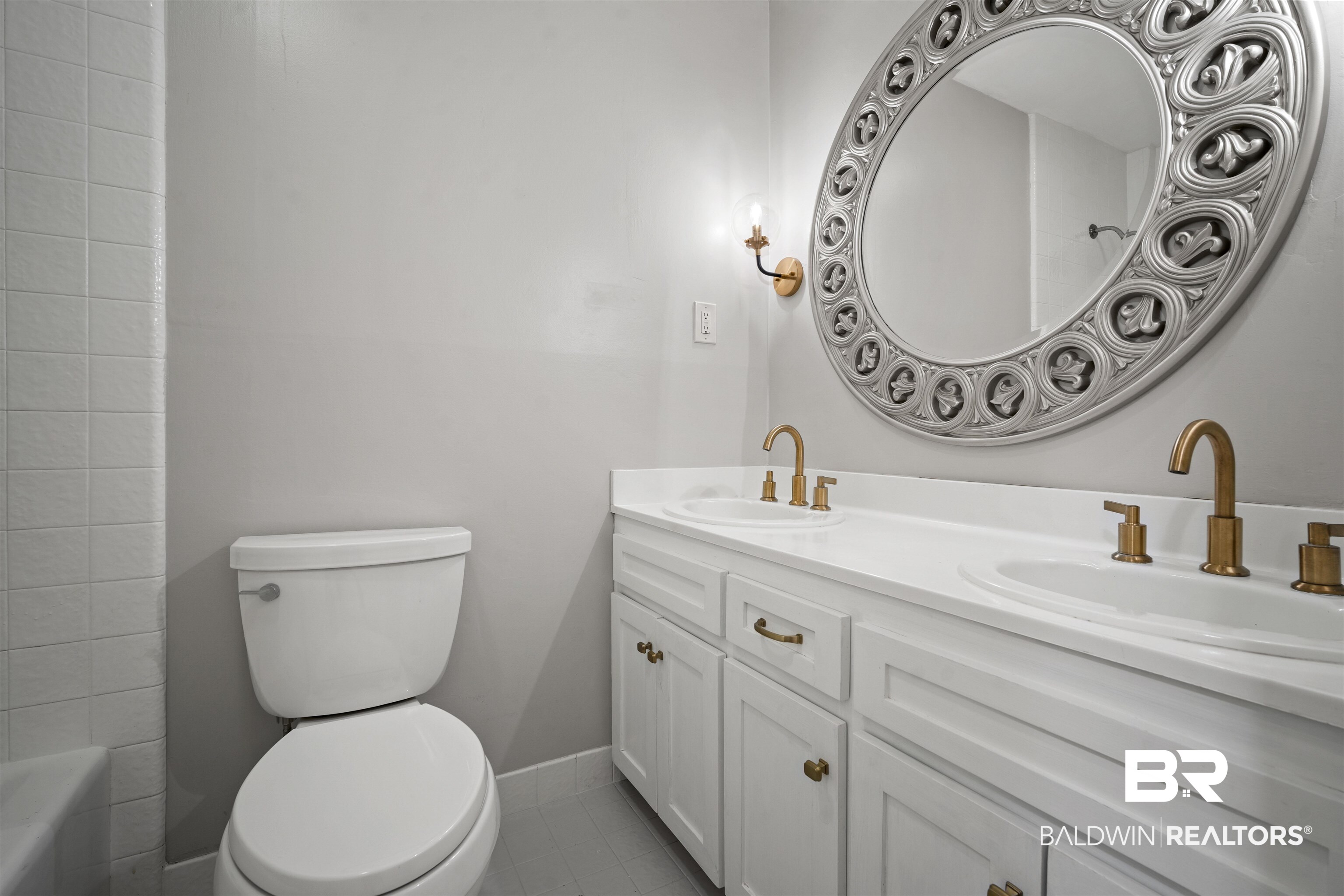 7912 Yorkhaven Road Mobile, AL 36695 - Photo 24 of 41 Bathroom featuring double vanity and light tile patterned flooring