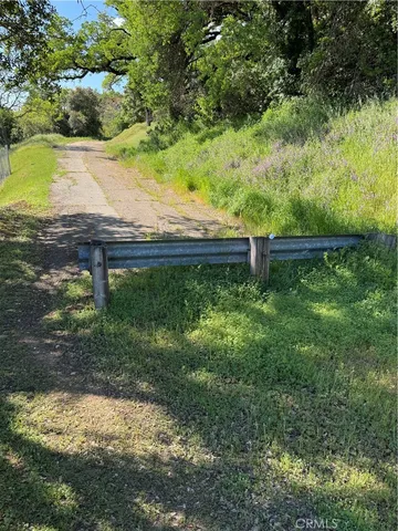 a view of a lake with a yard