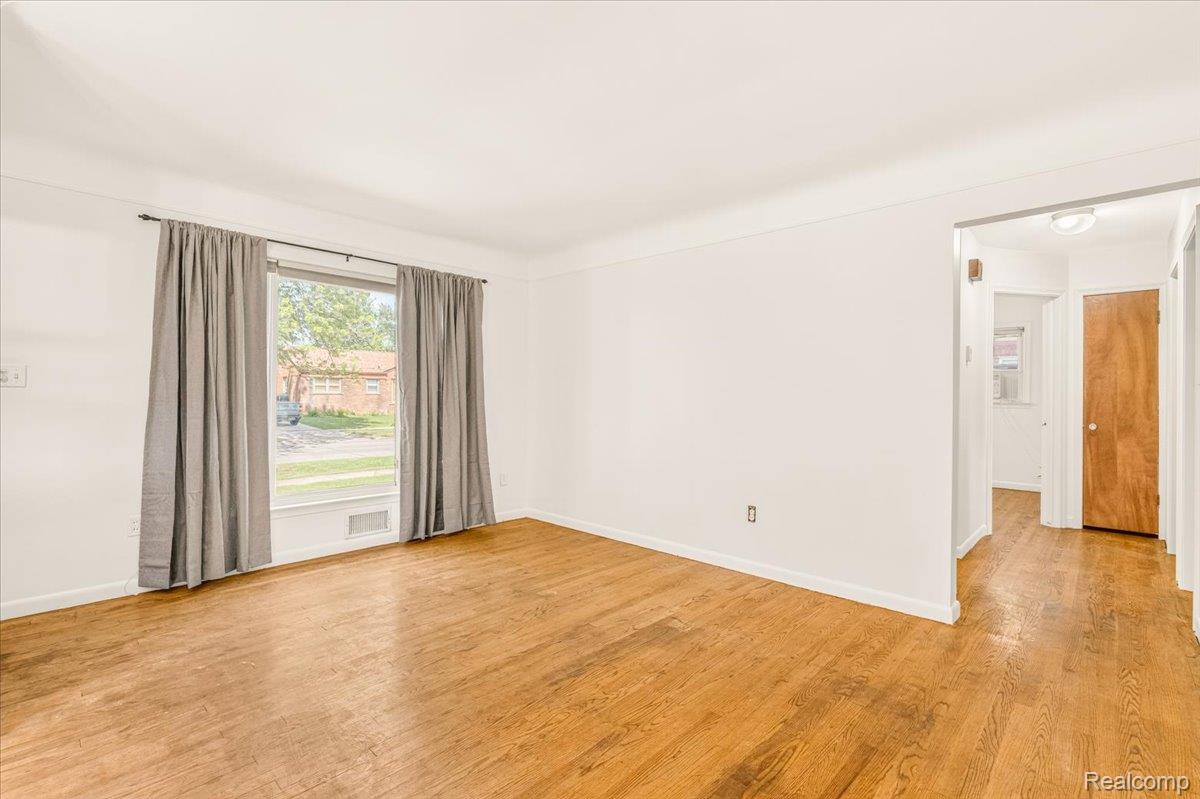 11802 Columbia Street Redford, MI 48239 - Photo 4 of 39 Original Hardwood Floors in good condition. Vinyl Replacement Windows throughout with great Natural Light.