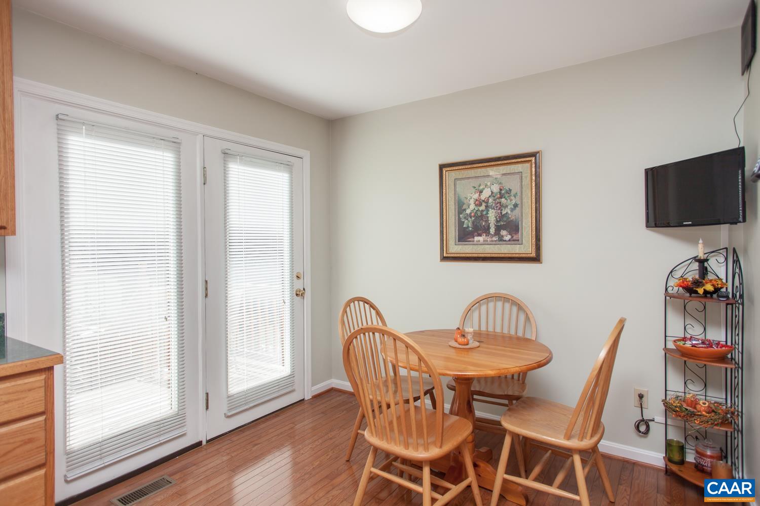 473 Reva Lane Ruckersville, VA 22968 - Photo 15 of 42 a view of a dining room with furniture window and wooden floor