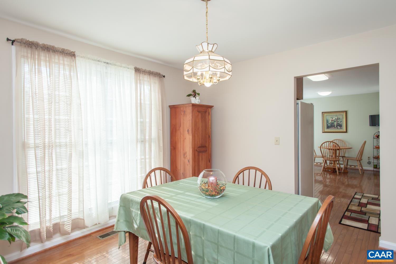 473 Reva Lane Ruckersville, VA 22968 - Photo 19 of 42 a view of a dining room with furniture window and outside view
