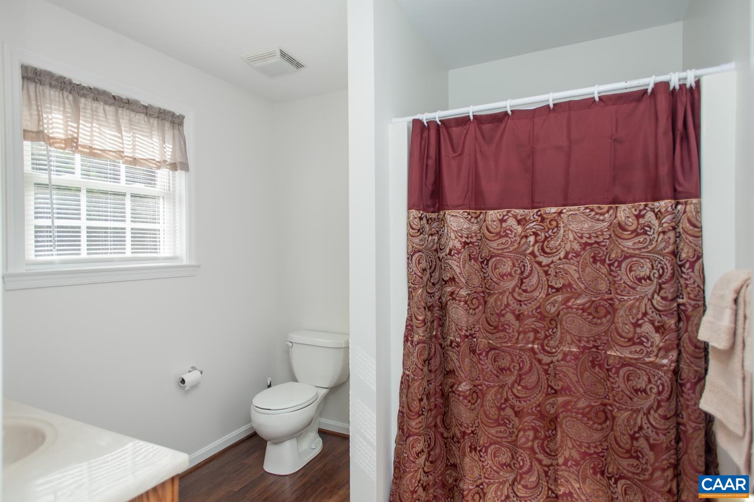 473 Reva Lane Ruckersville, VA 22968 - Photo 22 of 42 a bathroom with a toilet and a sink