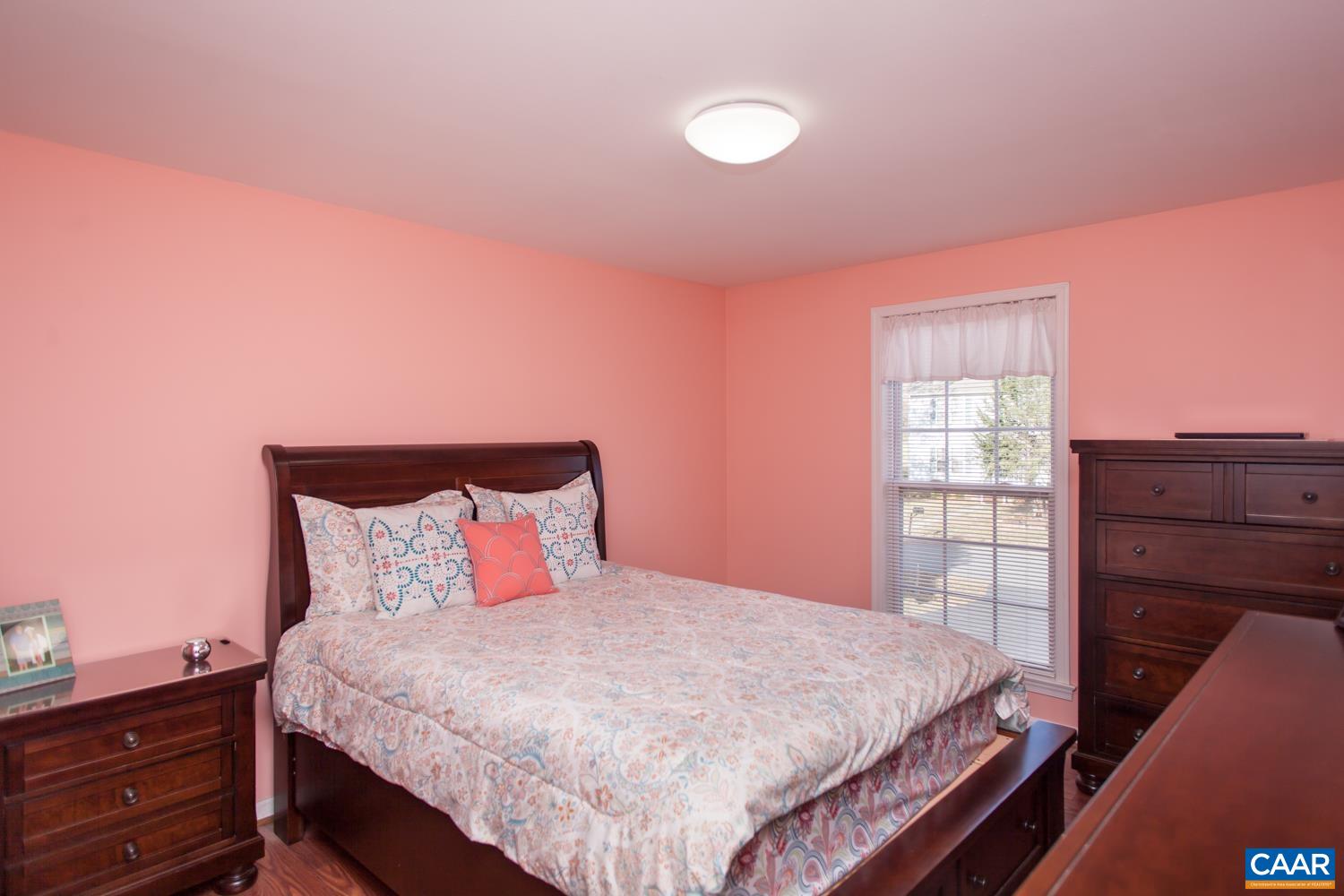 473 Reva Lane Ruckersville, VA 22968 - Photo 23 of 42 a bedroom with a bed and a dresser