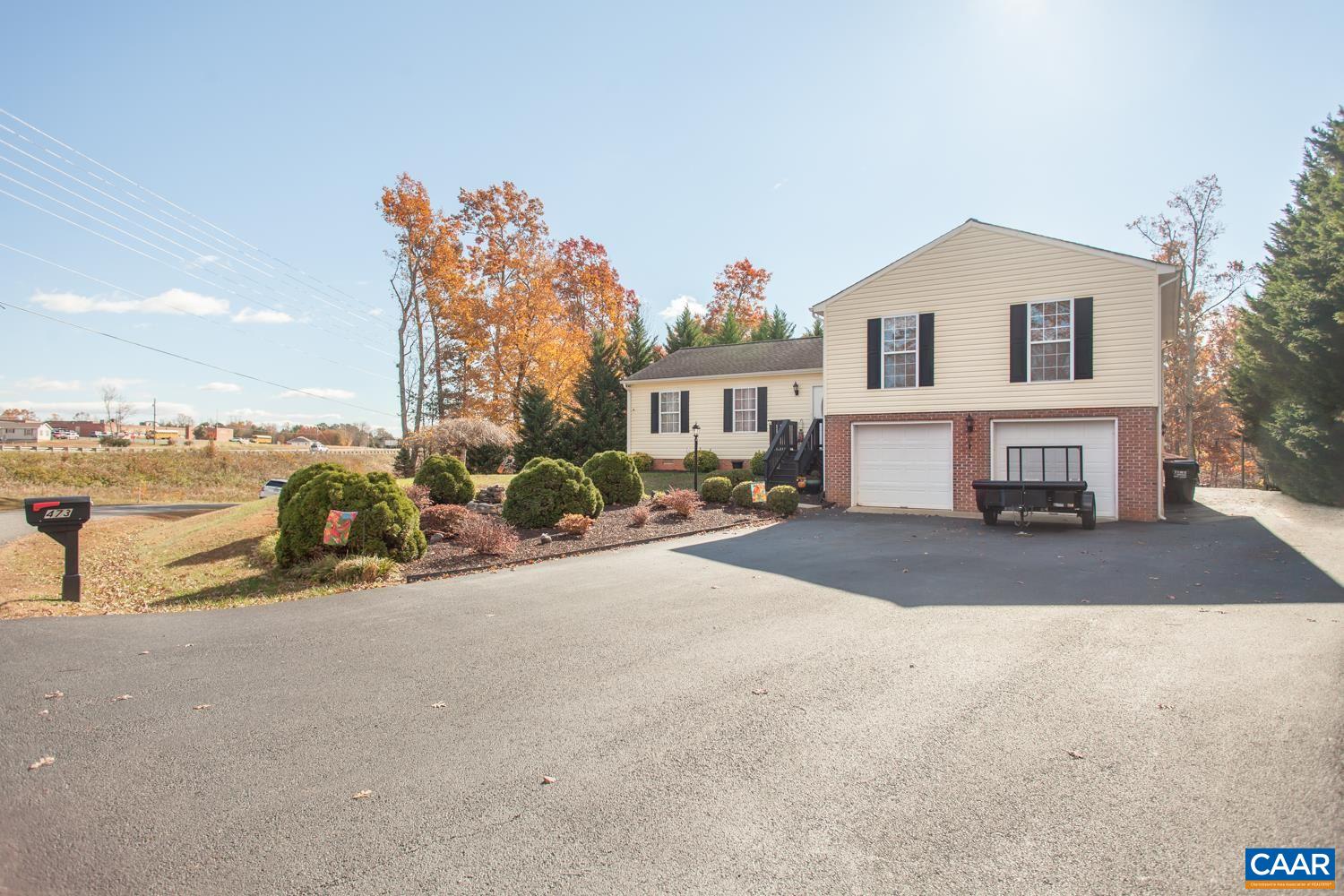 473 Reva Lane Ruckersville, VA 22968 - Photo 3 of 42 a view of a street with cars parked