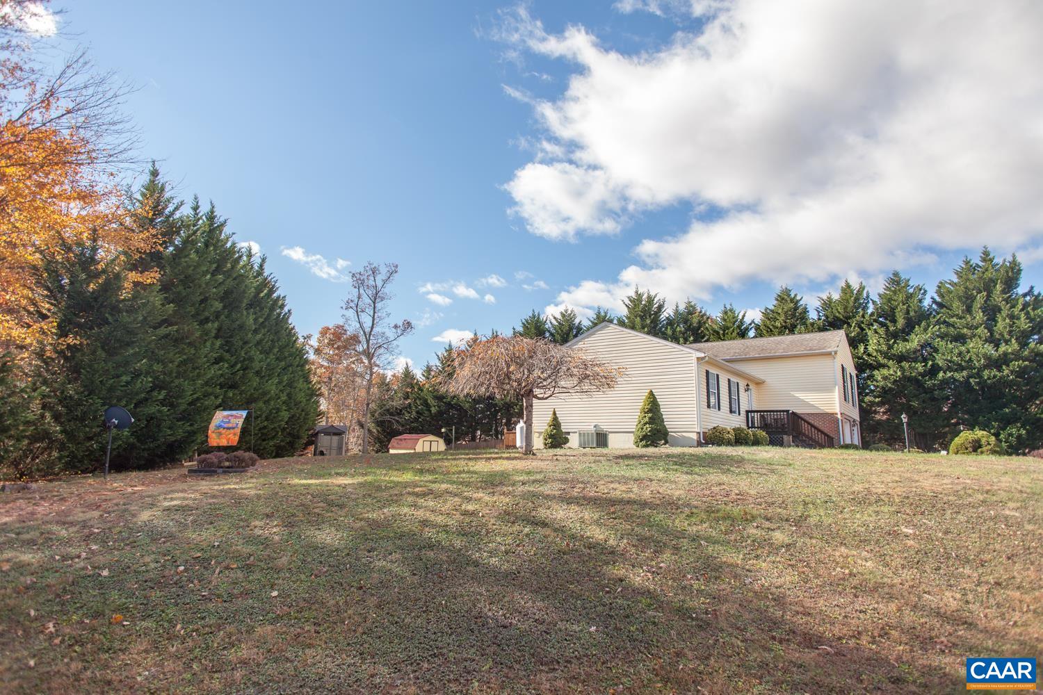 473 Reva Lane Ruckersville, VA 22968 - Photo 36 of 42 a view of a house with a yard
