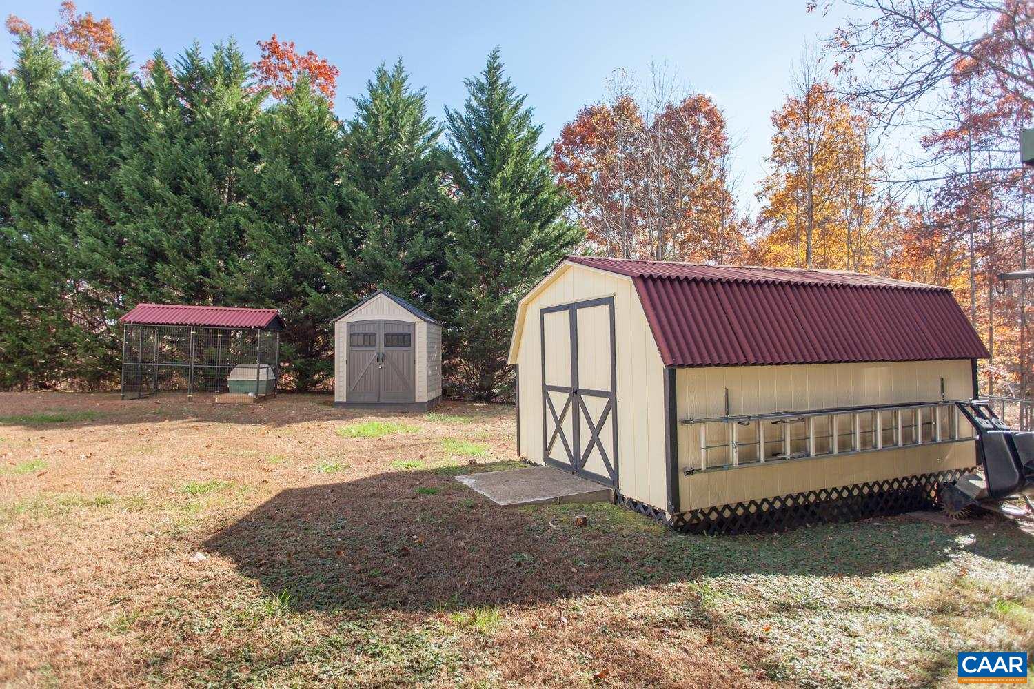 473 Reva Lane Ruckersville, VA 22968 - Photo 37 of 42 a view of backyard with a deck and a garden