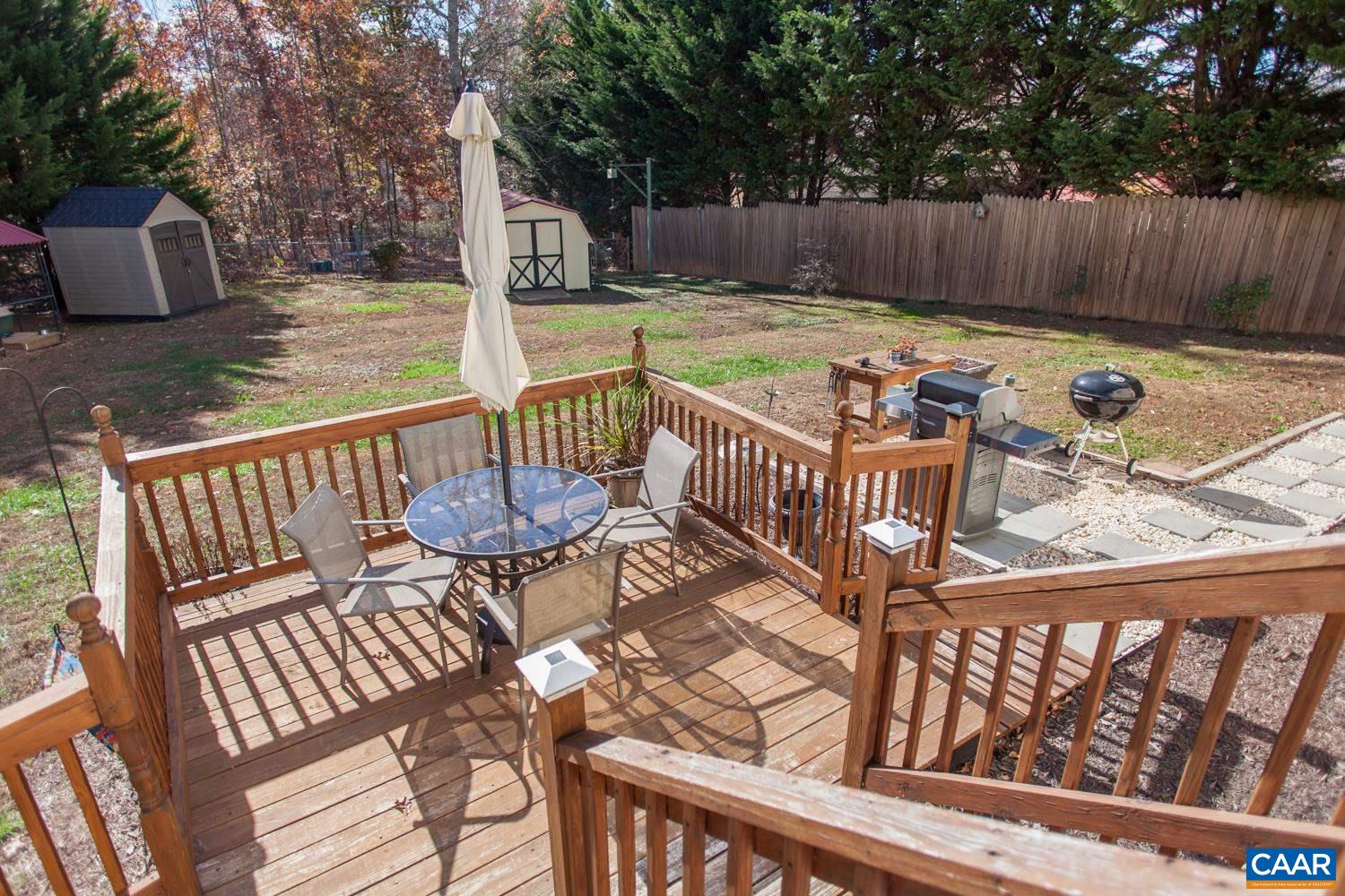 473 Reva Lane Ruckersville, VA 22968 - Photo 39 of 42 a view of a patio with two chairs and a table