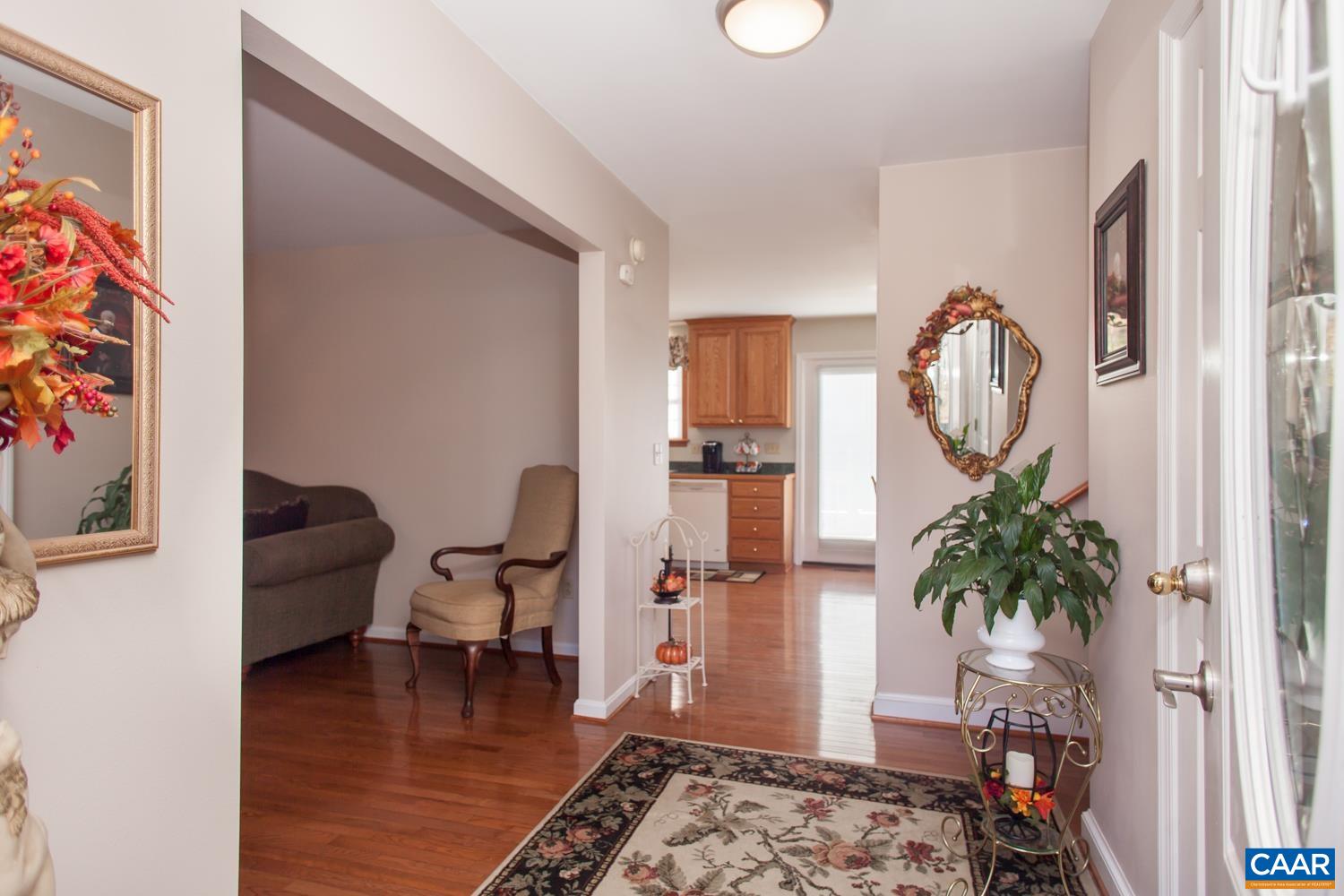 473 Reva Lane Ruckersville, VA 22968 - Photo 7 of 42 a living room with furniture and a potted plant