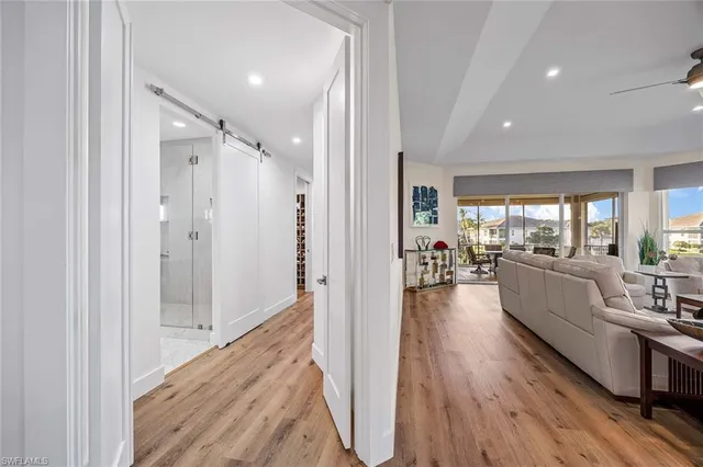 a view of a living room and hardwood floor