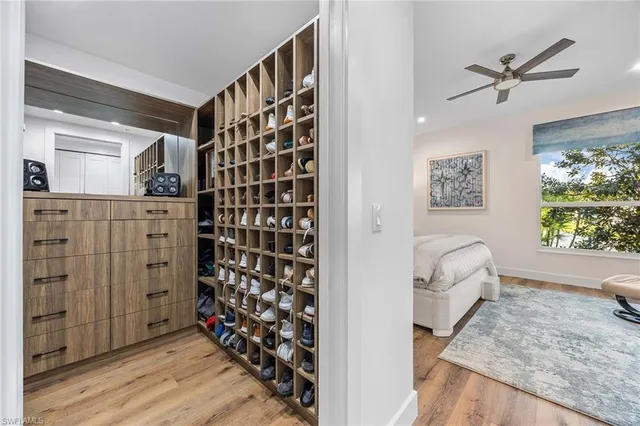 a view of livingroom with entryway and wooden floor