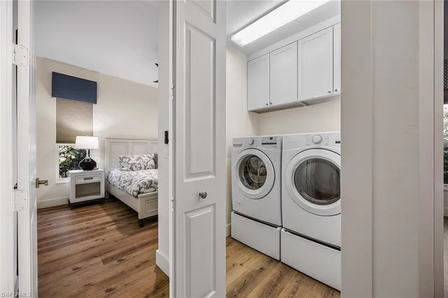 a view of a kitchen and washer and dryer