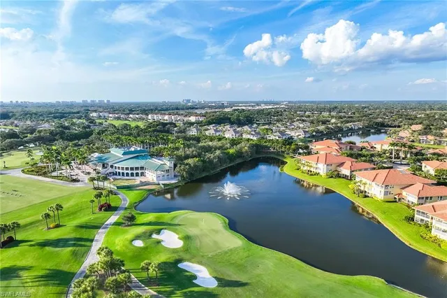 a view of a lake with a city