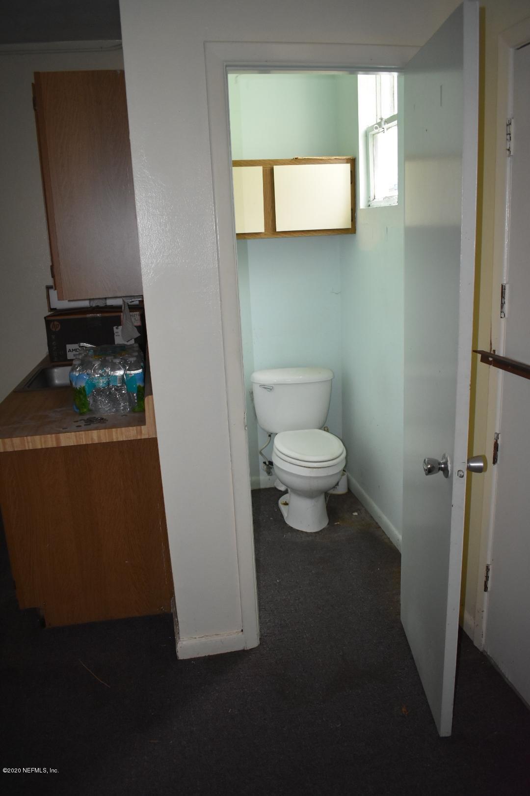 1832 Fouraker Road Jacksonville, FL 32221 - Photo 36 of 45 New Nasir - Empty Store Front Bathroom