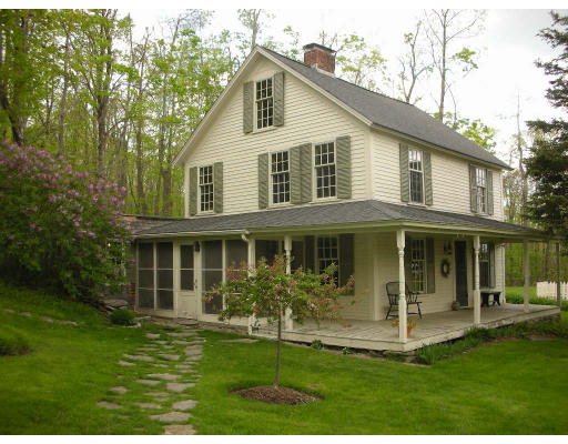 173 Mountain Road Princeton, MA 01541 - Photo 1 of 15 a front view of a house with a yard