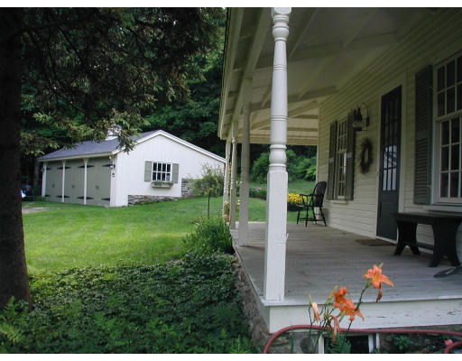 173 Mountain Road Princeton, MA 01541 - Photo 12 of 15 a house view with a garden space