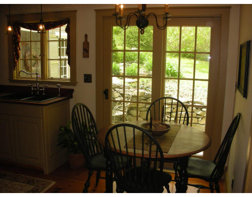 173 Mountain Road Princeton, MA 01541 - Photo 3 of 15 a view of a dining room with furniture window and outside view