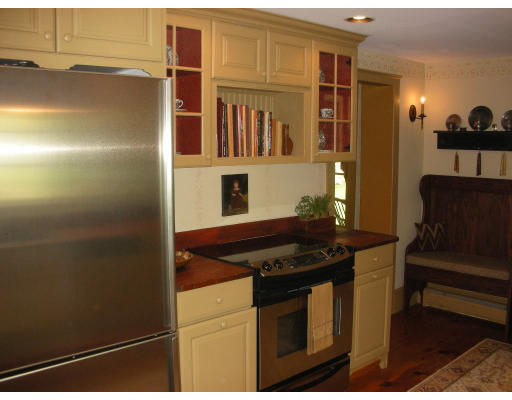 173 Mountain Road Princeton, MA 01541 - Photo 4 of 15 a kitchen with stainless steel appliances granite countertop a refrigerator and a stove