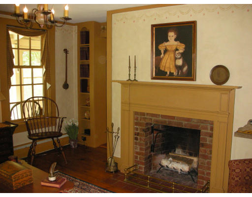 173 Mountain Road Princeton, MA 01541 - Photo 5 of 15 a view of a livingroom with furniture and a fireplace