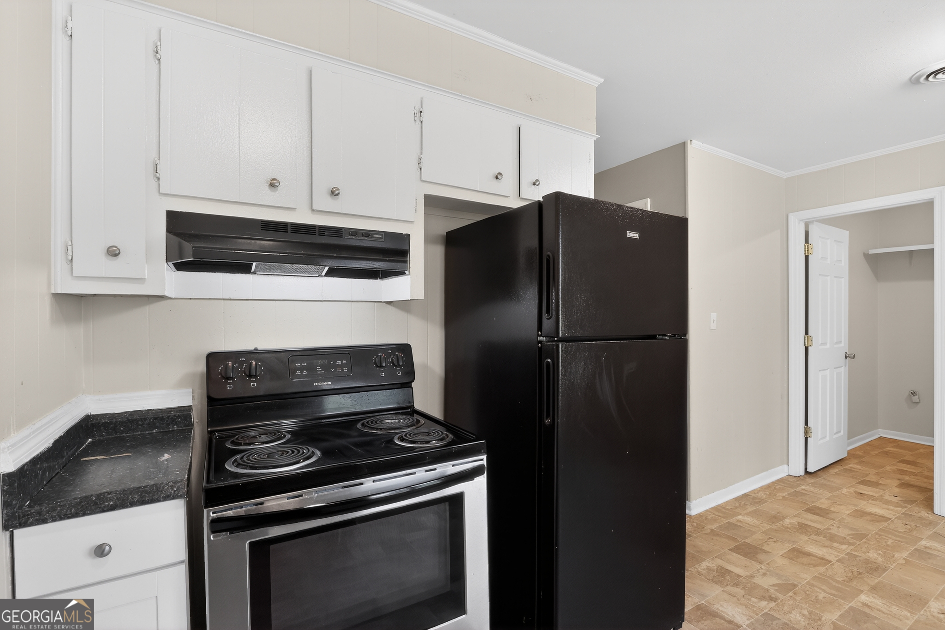 3606 Alene Circle Augusta, GA 30906 - Photo 14 of 30 a kitchen with a stove and a refrigerator