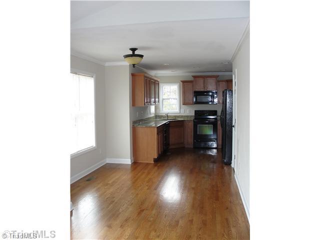Kitchen. Beautiful Kitchen with Solid Surface counter tops and Stainless Appliances!