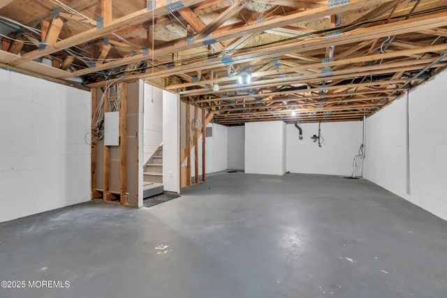 a view of a room with wooden walls