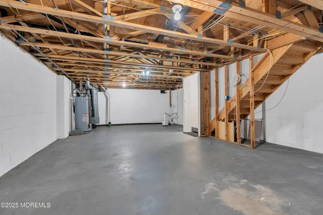 a view of a room with wooden walls