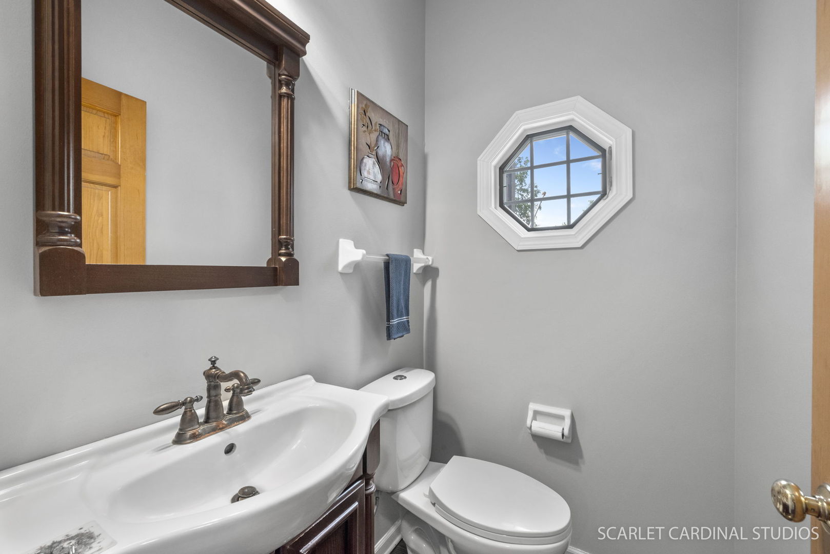 2632 Sweetbroom Road Naperville, IL 60564 - Photo 11 of 33 a bathroom with a toilet a sink and a mirror
