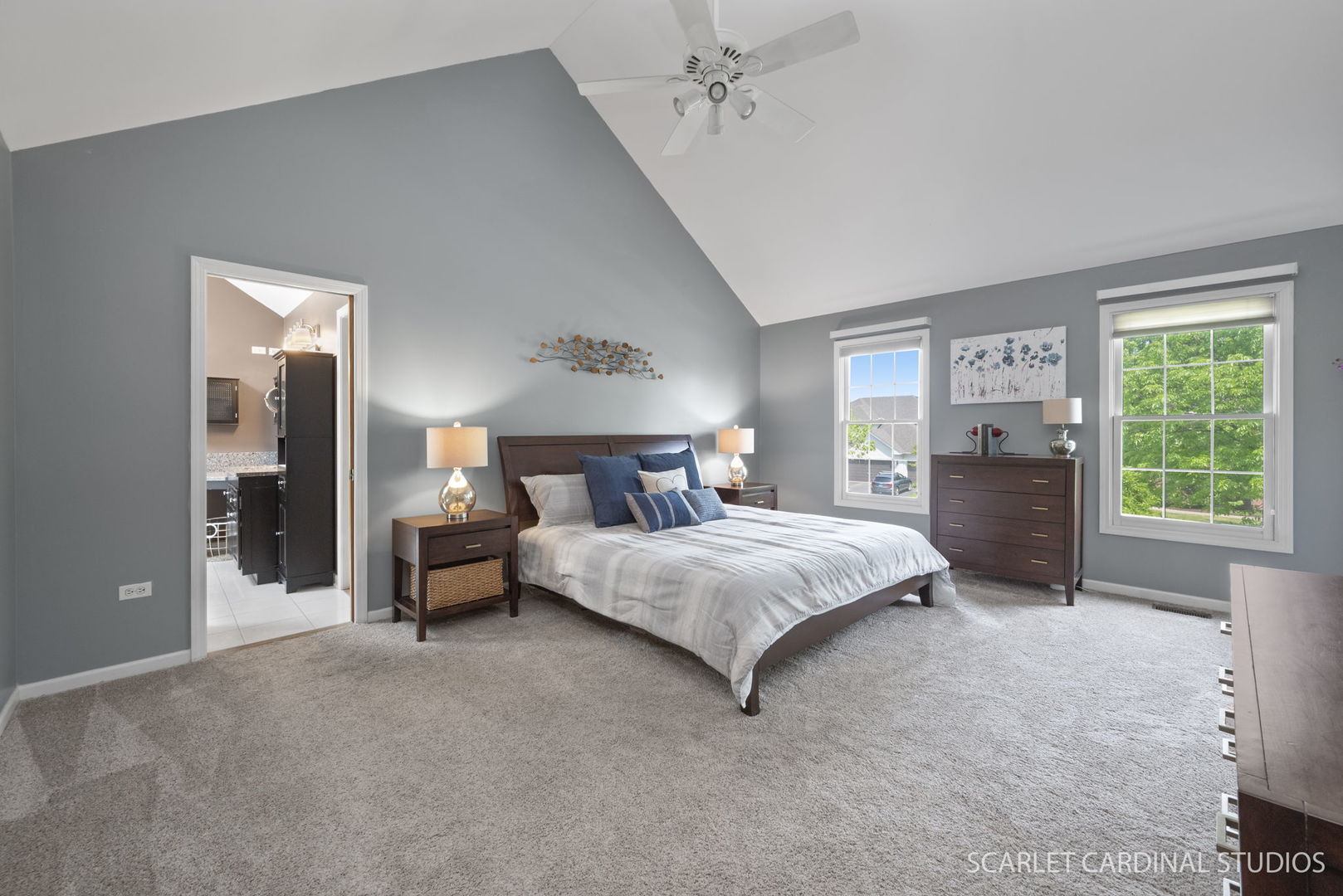 2632 Sweetbroom Road Naperville, IL 60564 - Photo 13 of 33 a bedroom with a large bed and a chandelier