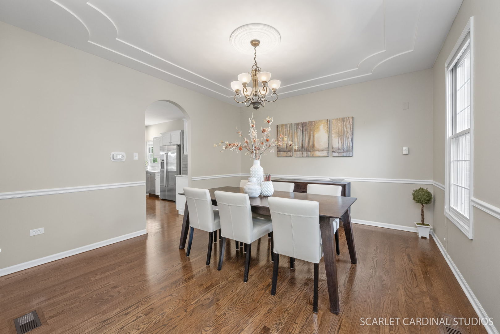 2632 Sweetbroom Road Naperville, IL 60564 - Photo 9 of 33 a view of a dining room with furniture a chandelier and wooden floor
