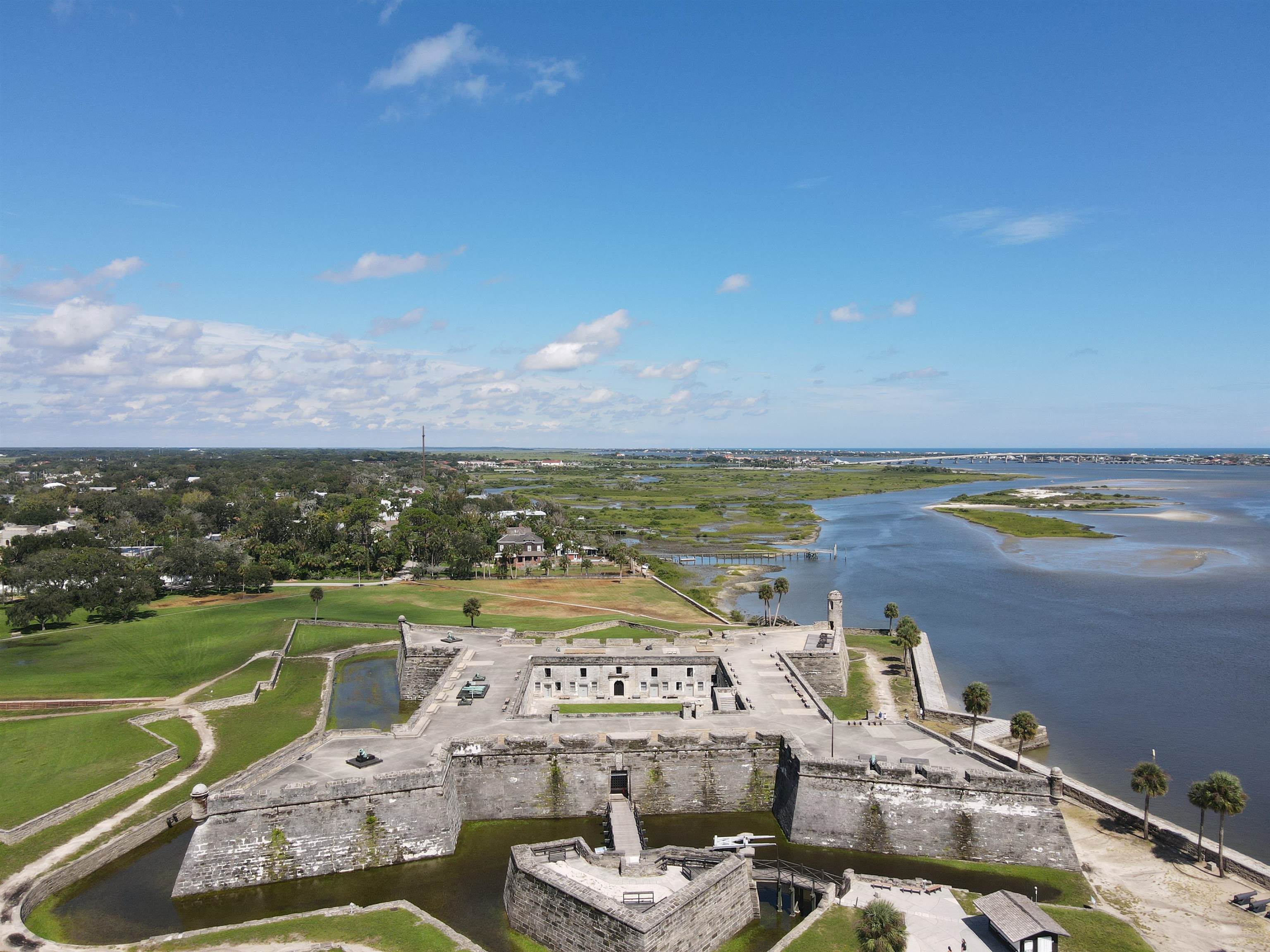 101 Flagler Boulevard, Unit D St. Augustine, FL 32080 - Photo 13 of 16 a view of a lake with lawn chairs