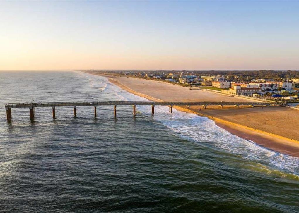 101 Flagler Boulevard, Unit D St. Augustine, FL 32080 - Photo 15 of 16 a view of swimming pool with outdoor seating and yard in back