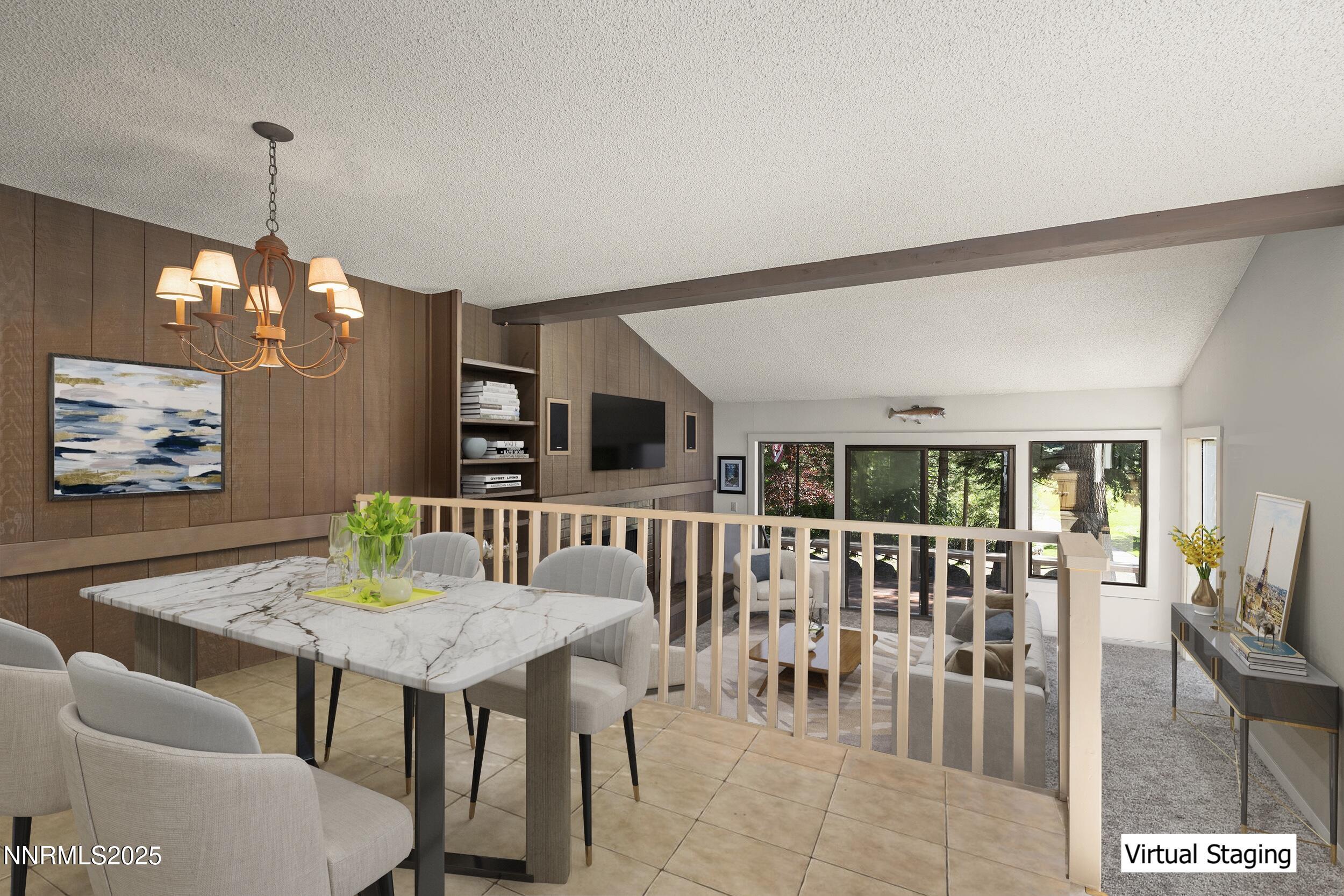 954 Fairway Boulevard, Unit 4 Incline Village, NV 89451 - Photo 5 of 28 a view of a dining room with furniture and chandelier