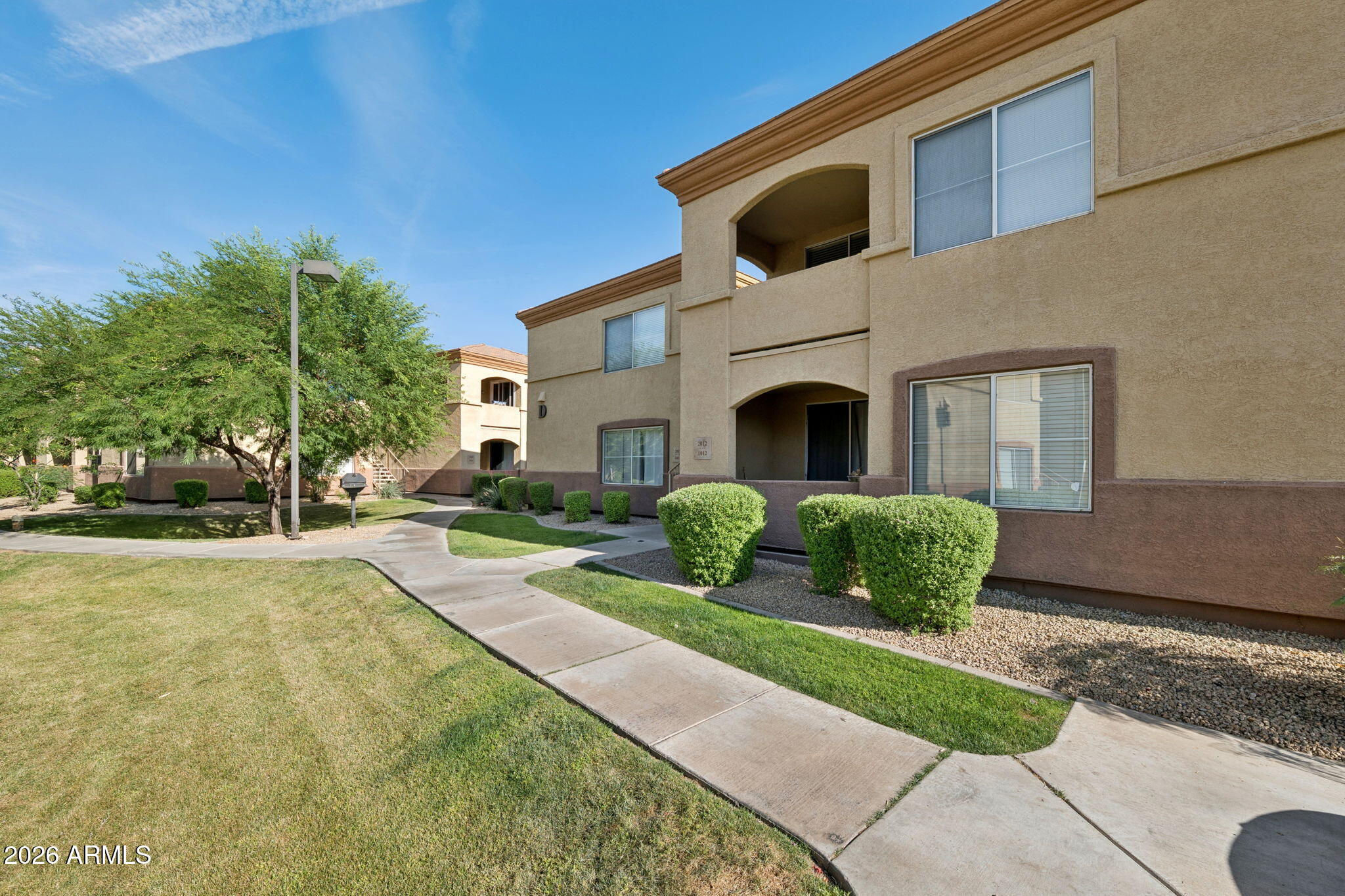 2134 East Broadway Road, Unit 2011 Tempe, AZ 85282 - Photo 3 of 28 Lush Landscaping Throughout