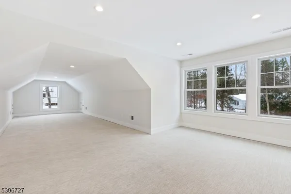 a view of a room with an empty space