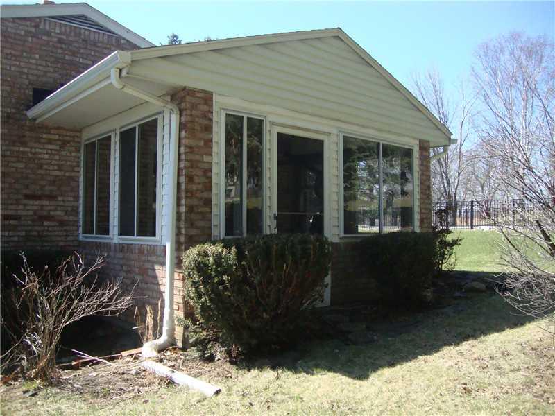 313 Madison Heights Road New Stanton, PA 15672 - Photo 22 of 25 Sunroom. 13 X 10 Brick / Glass Doors to Dining