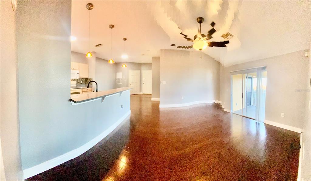 5451 Vineland Road, Unit 2309 Orlando, FL 32811 - Photo 15 of 38 a view interior of the house with wooden floor