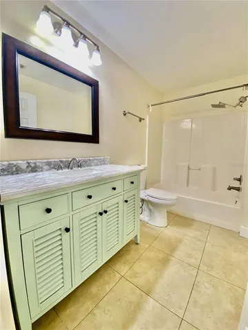 a bathroom with a shower and a shower