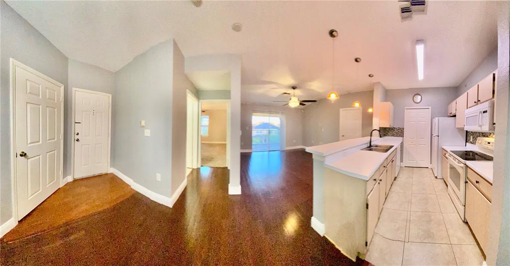 5451 Vineland Road, Unit 2309 Orlando, FL 32811 - Photo 35 of 38 a very nice looking room with a large mirror