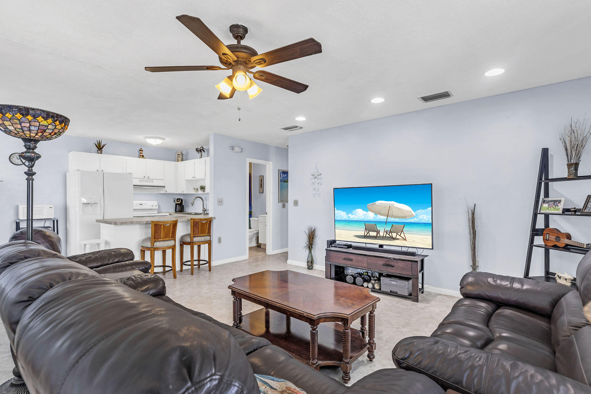 106 Channel Drive, Unit B Marathon, FL 33050 - Photo 2 of 33 a living room with furniture and a flat screen tv