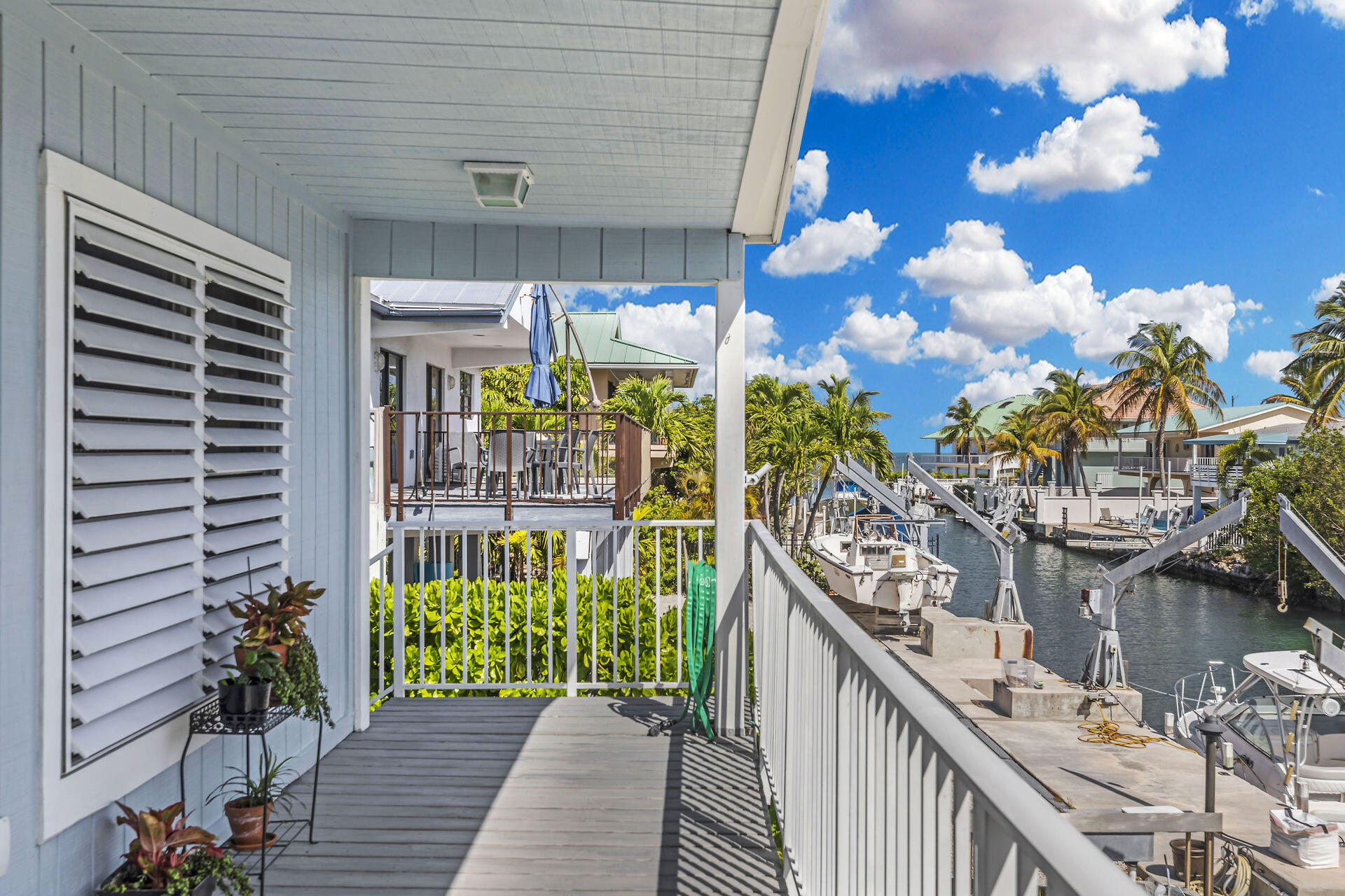 106 Channel Drive, Unit B Marathon, FL 33050 - Photo 24 of 33 a balcony view with a garden space