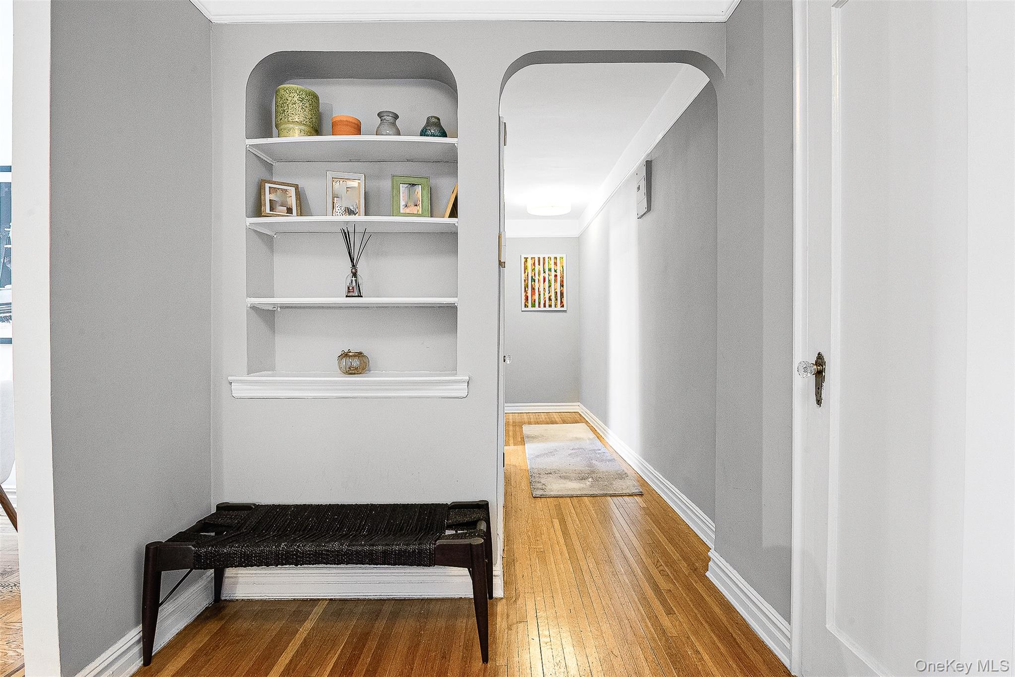 99-45 67th Road, Unit 514 Queens, NY 11375 - Photo 12 of 22 a view of utility room and wooden floor