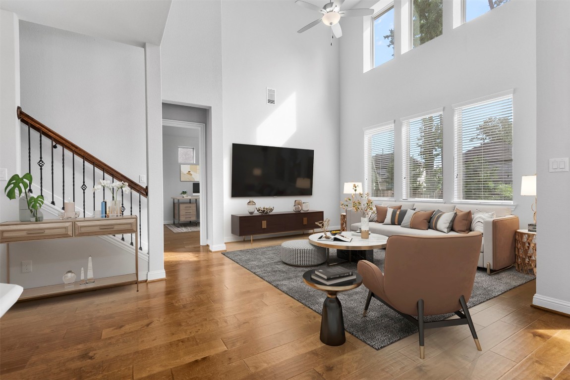148 Gray Pne Grove Conroe, TX 77318 - Photo 19 of 46 a living room with furniture and a flat screen tv