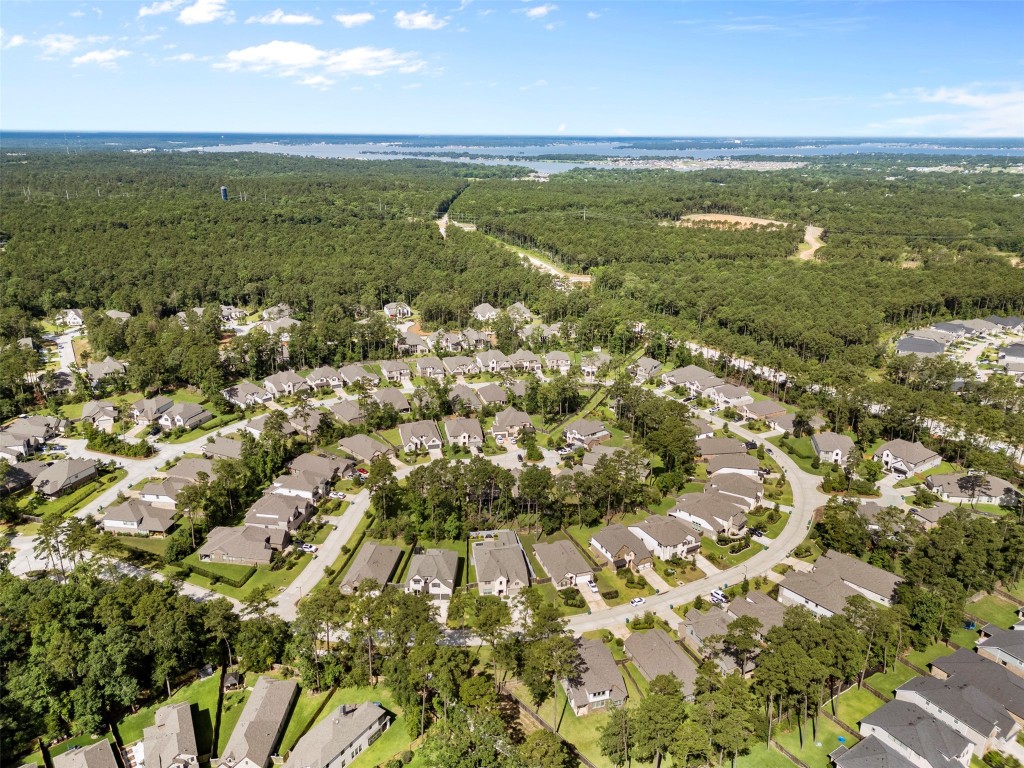 148 Gray Pne Grove Conroe, TX 77318 - Photo 8 of 46 a view of a city with an ocean