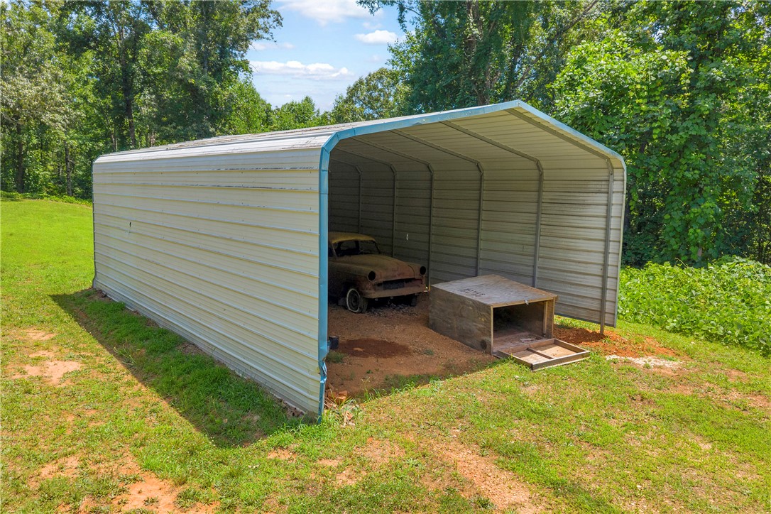 952 Stephens Drive Westminster, SC 29693 - Photo 14 of 50 Secure covered structure offers ample space for vehicle protection and additional storage.