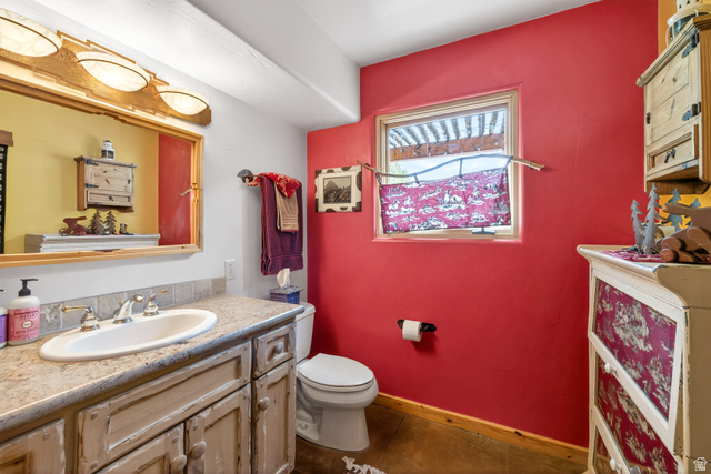 3617 Red Rock Drive Moab, UT 84532 - Photo 32 of 79 Half bath with toilet and vanity