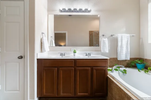 a view of a swimming pool with a yard